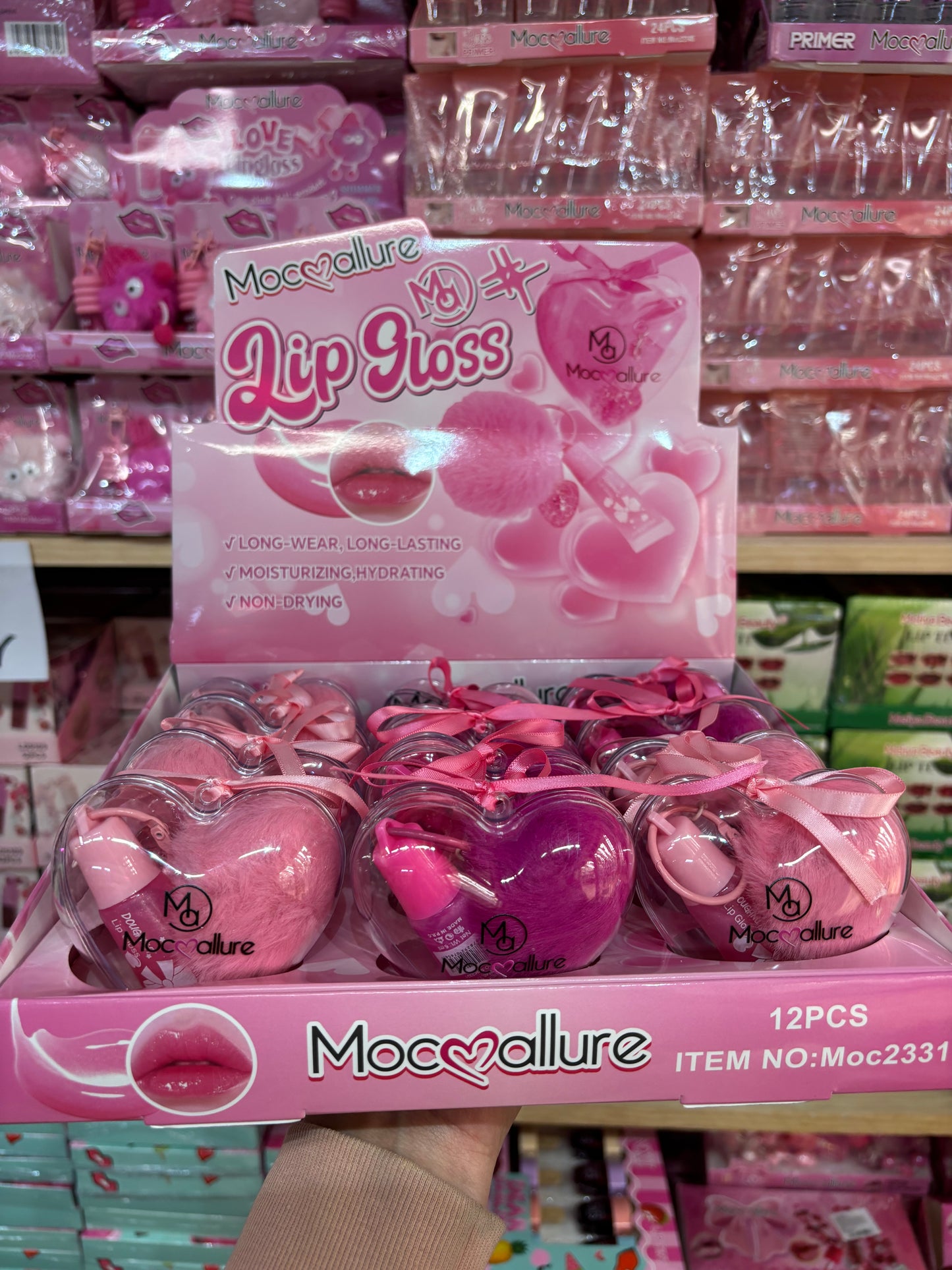 Gloss doble con pompón