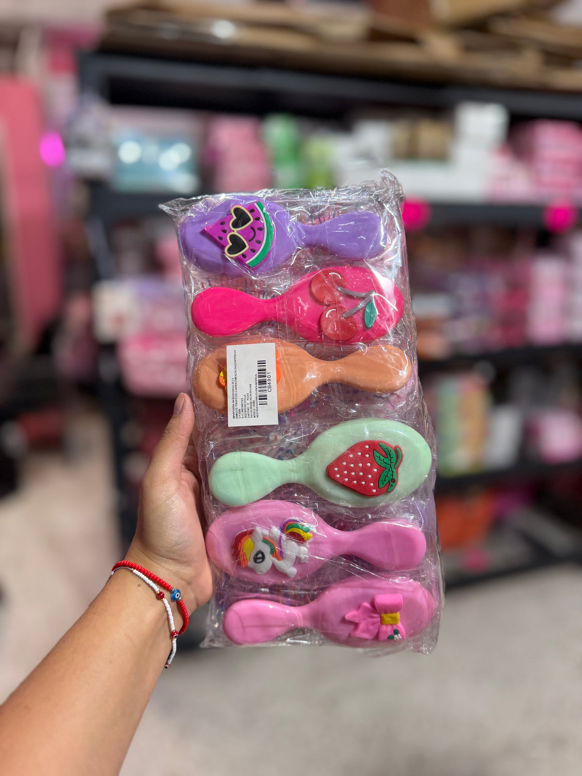 Mini cepillo para el pelo