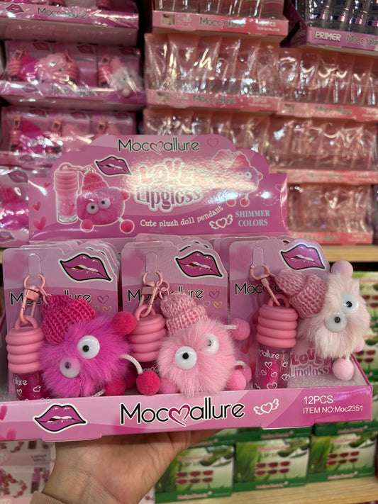 Gloss con muñequito