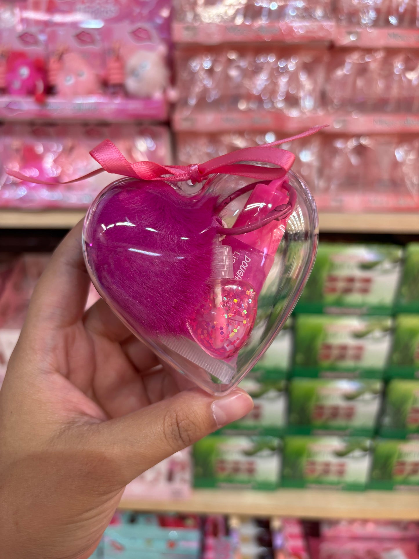 Gloss doble con pompón